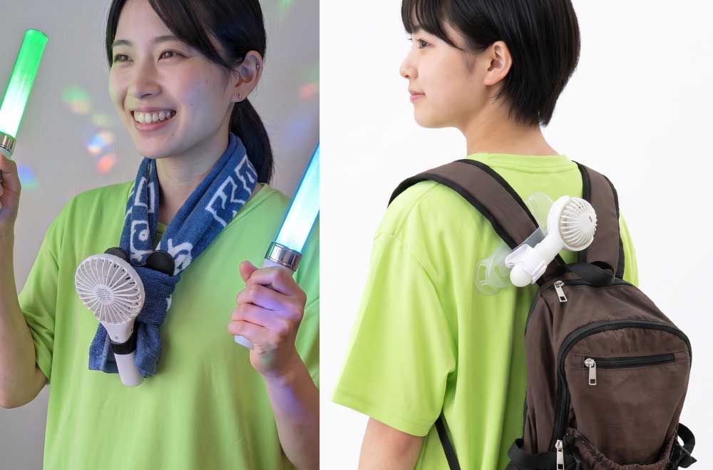 夏フェスを楽しむ女性が首にかけたタオルにハンディファンを取り付けて両手が自由に使えて楽しんでいる様子